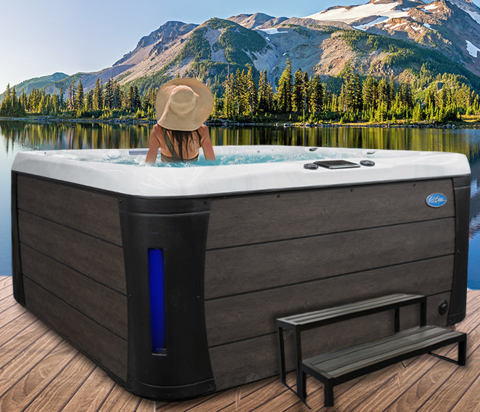 Hot Tubs, Spas, Portable Spas, Swim Spas for Sale Calspas hot tub being used in a family setting - hot tubs spas for sale Carterville